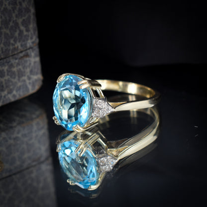 Blue Topaz and Diamond Oval Solitaire 9ct Yellow Gold Ring