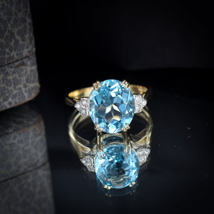 Blue Topaz and Diamond Oval Solitaire 9ct Yellow Gold Ring