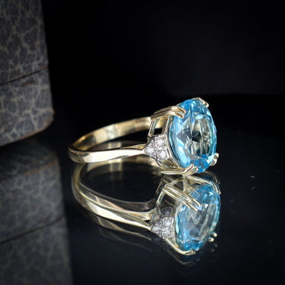 Blue Topaz and Diamond Oval Solitaire 9ct Yellow Gold Ring