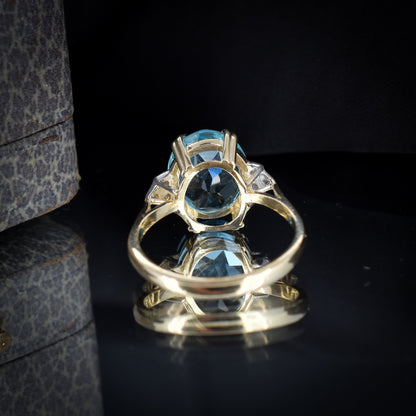 Blue Topaz and Diamond Oval Solitaire 9ct Yellow Gold Ring