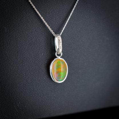 0.96ct Natural Fire Opal Oval Platinum Charm Pendant