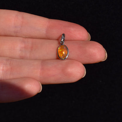 0.96ct Natural Fire Opal Oval Platinum Charm Pendant