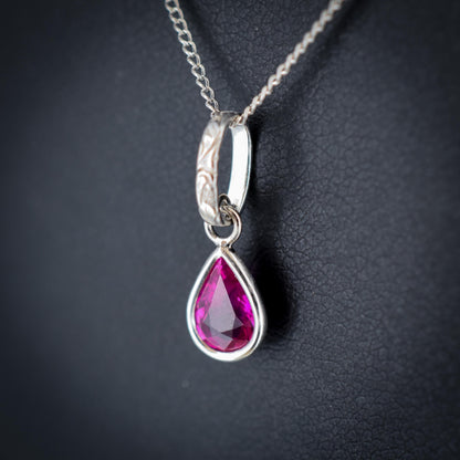 0.70ct Natural Ruby Pear Cut Platinum Charm Pendant