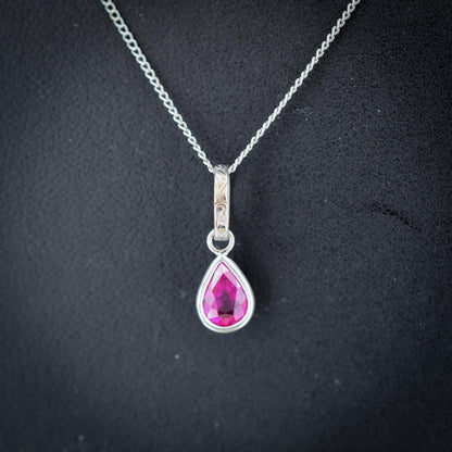 0.70ct Natural Ruby Pear Cut Platinum Charm Pendant