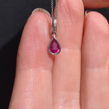 0.70ct Natural Ruby Pear Cut Platinum Charm Pendant