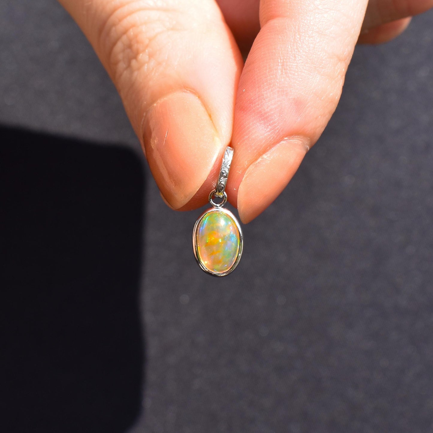 0.96ct Natural Fire Opal Oval Platinum Charm Pendant