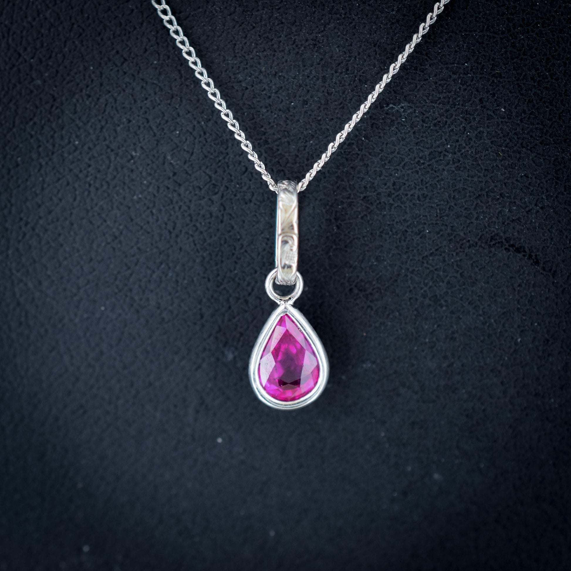 0.70ct Natural Ruby Pear Cut Platinum Charm Pendant