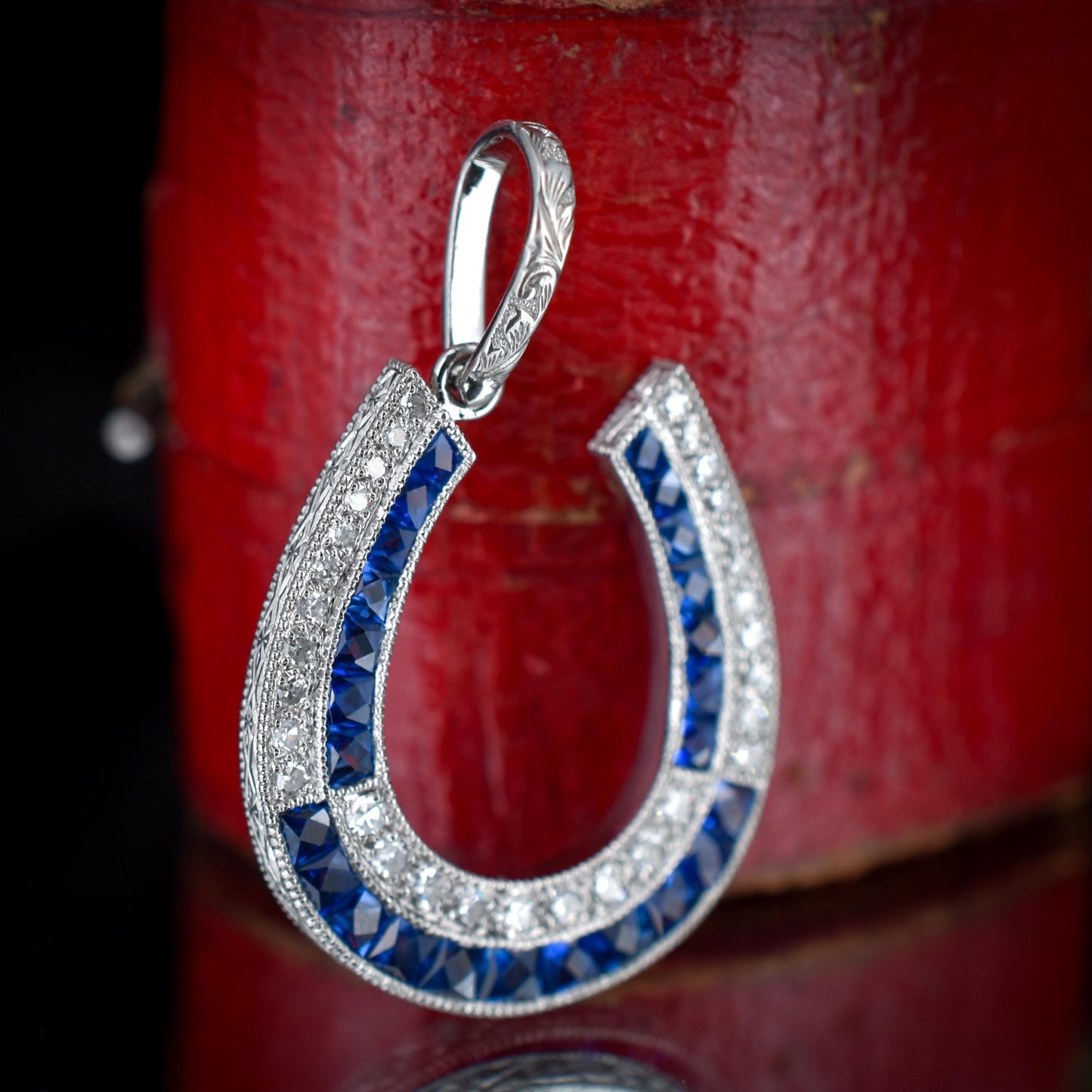 Blue Sapphire and Diamond Double Row Horseshoe Platinum Charm Pendant