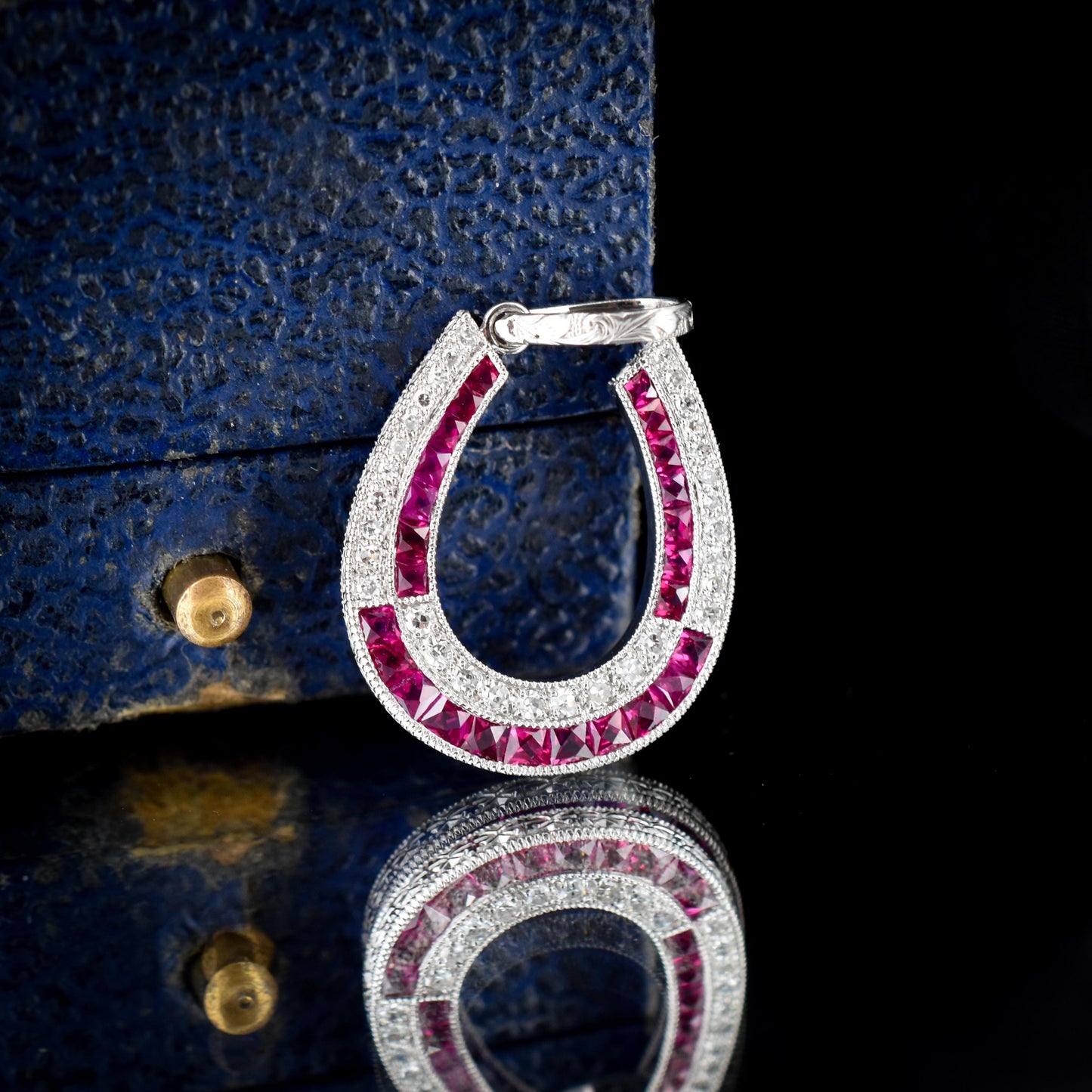 Ruby and Diamond Double Row Horseshoe Platinum Charm Pendant