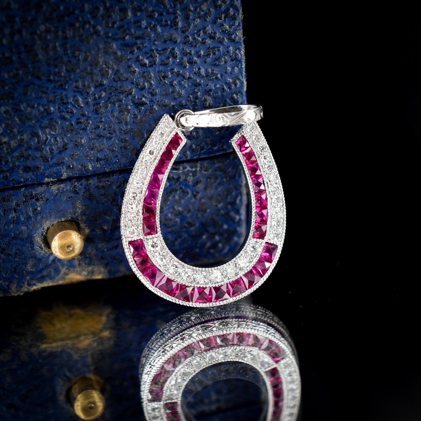 Ruby and Diamond Double Row Horseshoe Platinum Charm Pendant