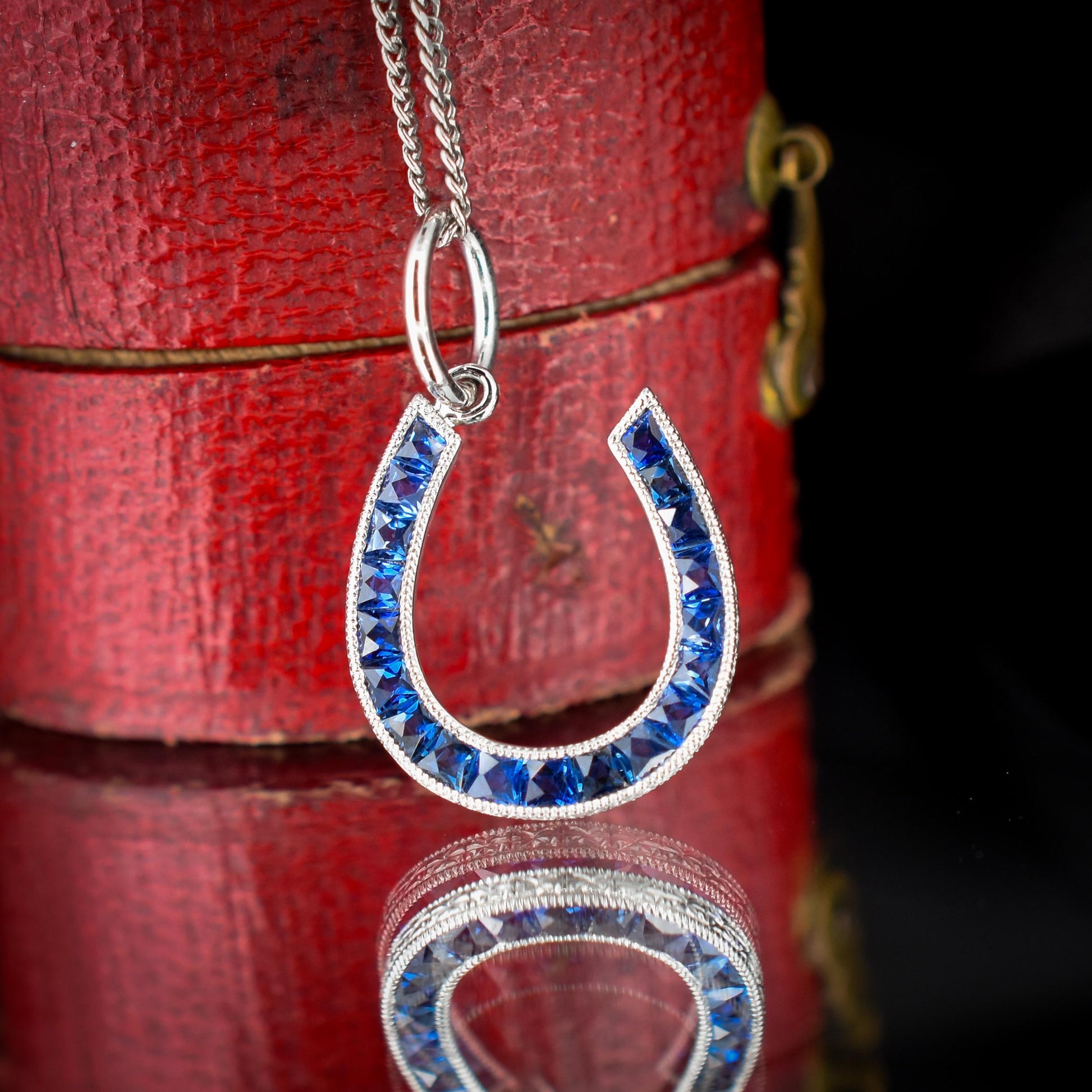 French Cut Royal Blue Sapphire Horseshoe Platinum Charm Pendant - 0.55ct