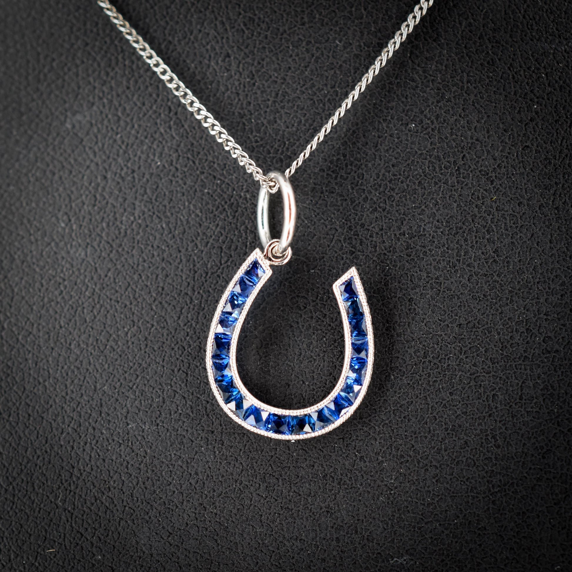 French Cut Royal Blue Sapphire Horseshoe Platinum Charm Pendant - 0.55ct