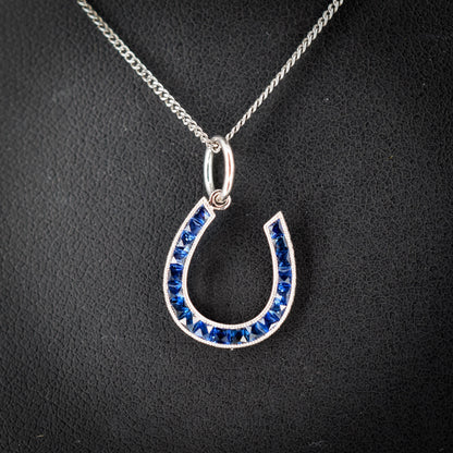 French Cut Royal Blue Sapphire Horseshoe Platinum Charm Pendant - 0.55ct