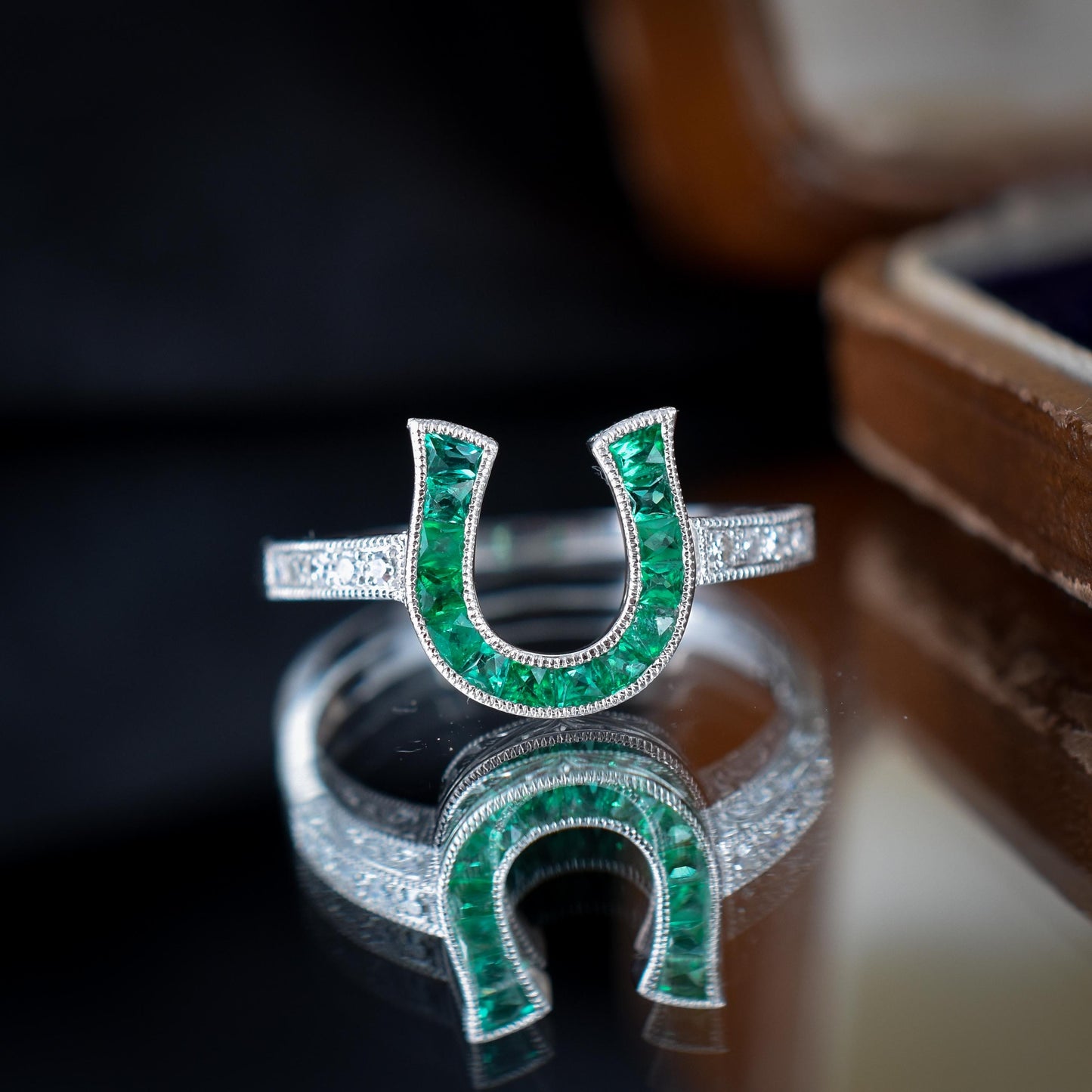 French Cut 0.40ct Emerald and Diamond Horseshoe Platinum Ring