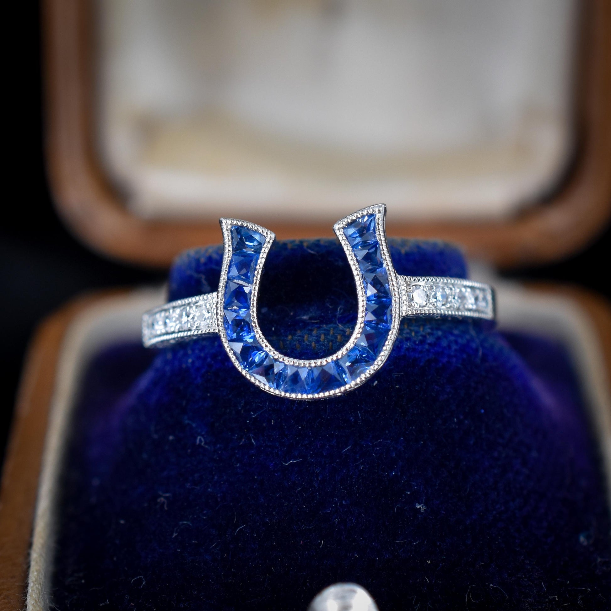 French Cut 0.55ct Blue Sapphire and Diamond Horseshoe Platinum Ring