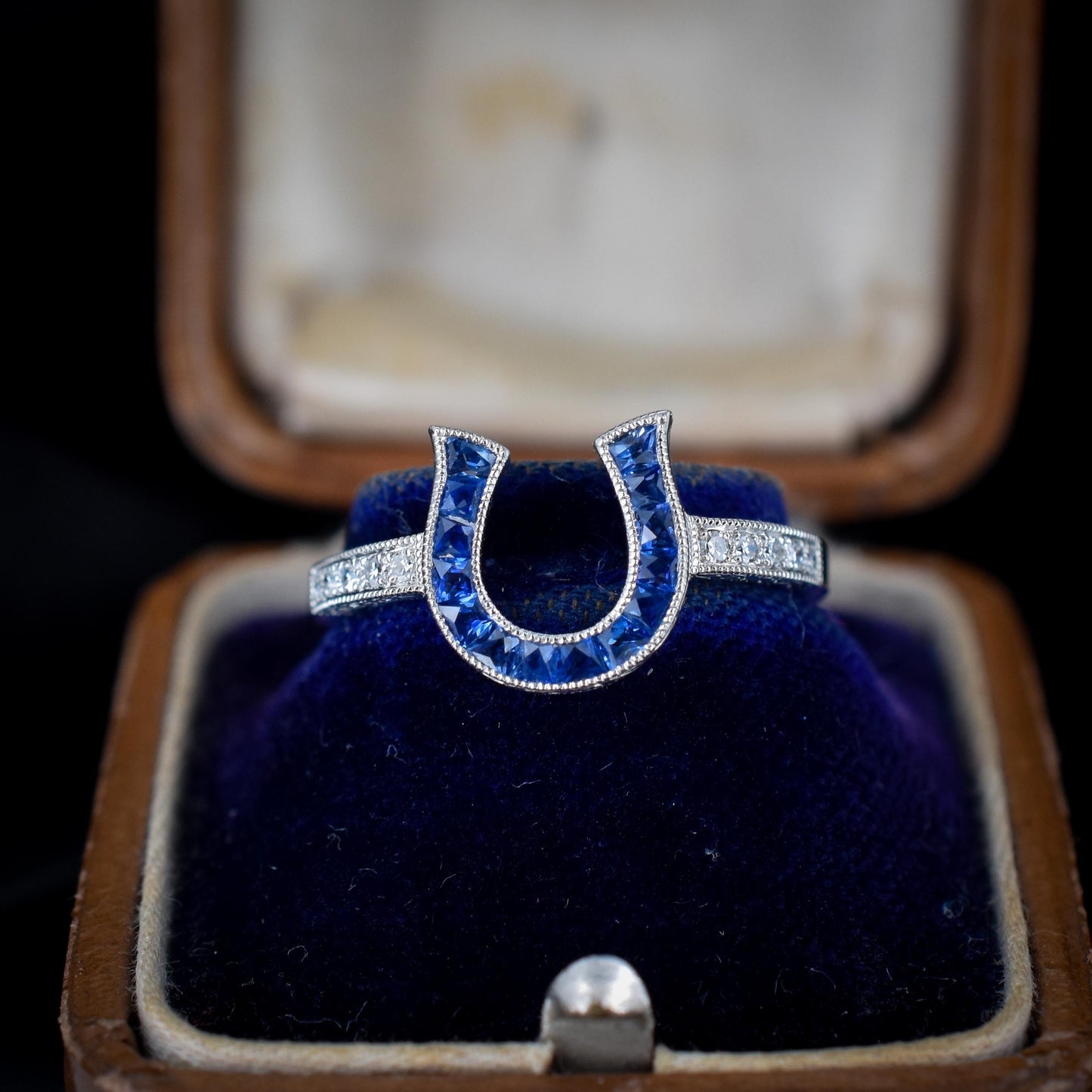 French Cut 0.55ct Blue Sapphire and Diamond Horseshoe Platinum Ring