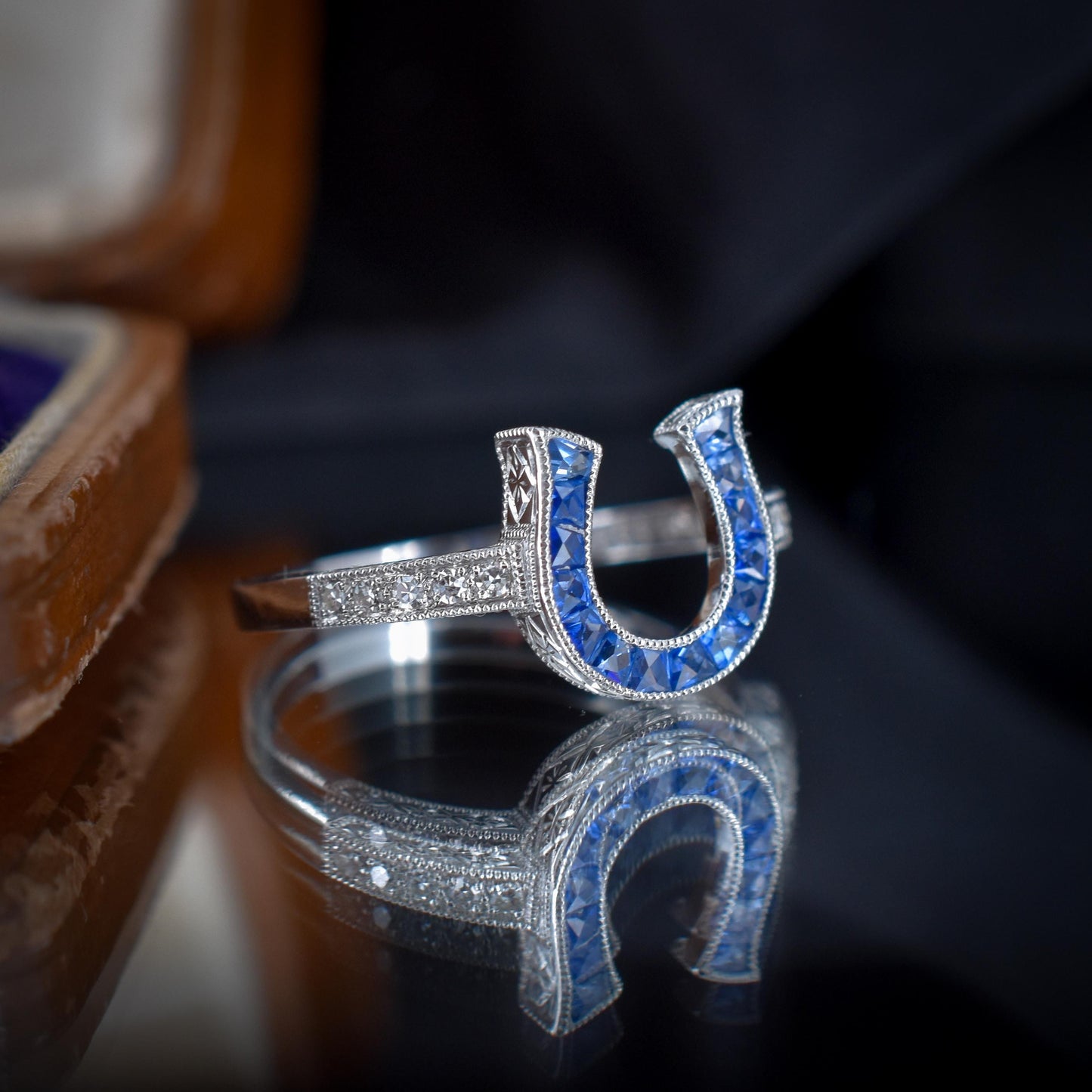 French Cut 0.55ct Blue Sapphire and Diamond Horseshoe Platinum Ring