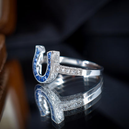 French Cut 0.55ct Blue Sapphire and Diamond Horseshoe Platinum Ring