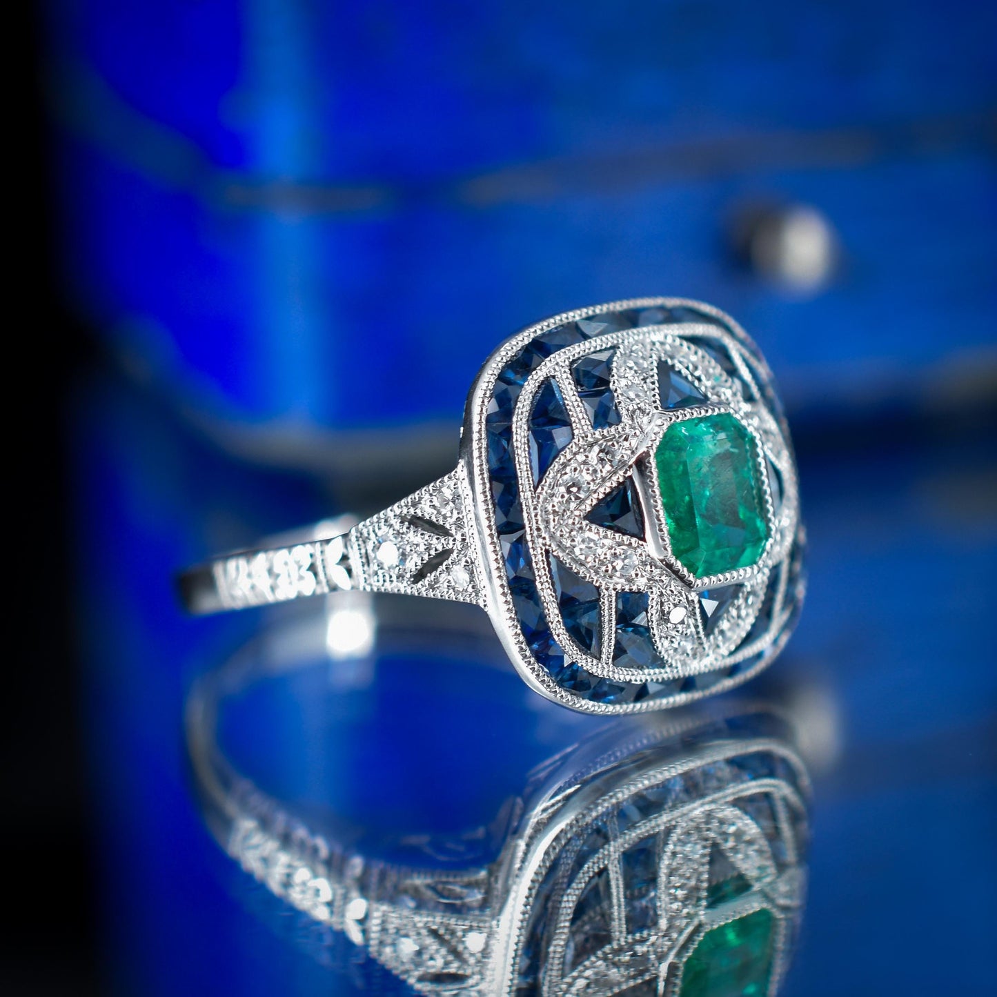 Art Deco Style Natural Emerald Diamond and Sapphire Platinum Cocktail Ring