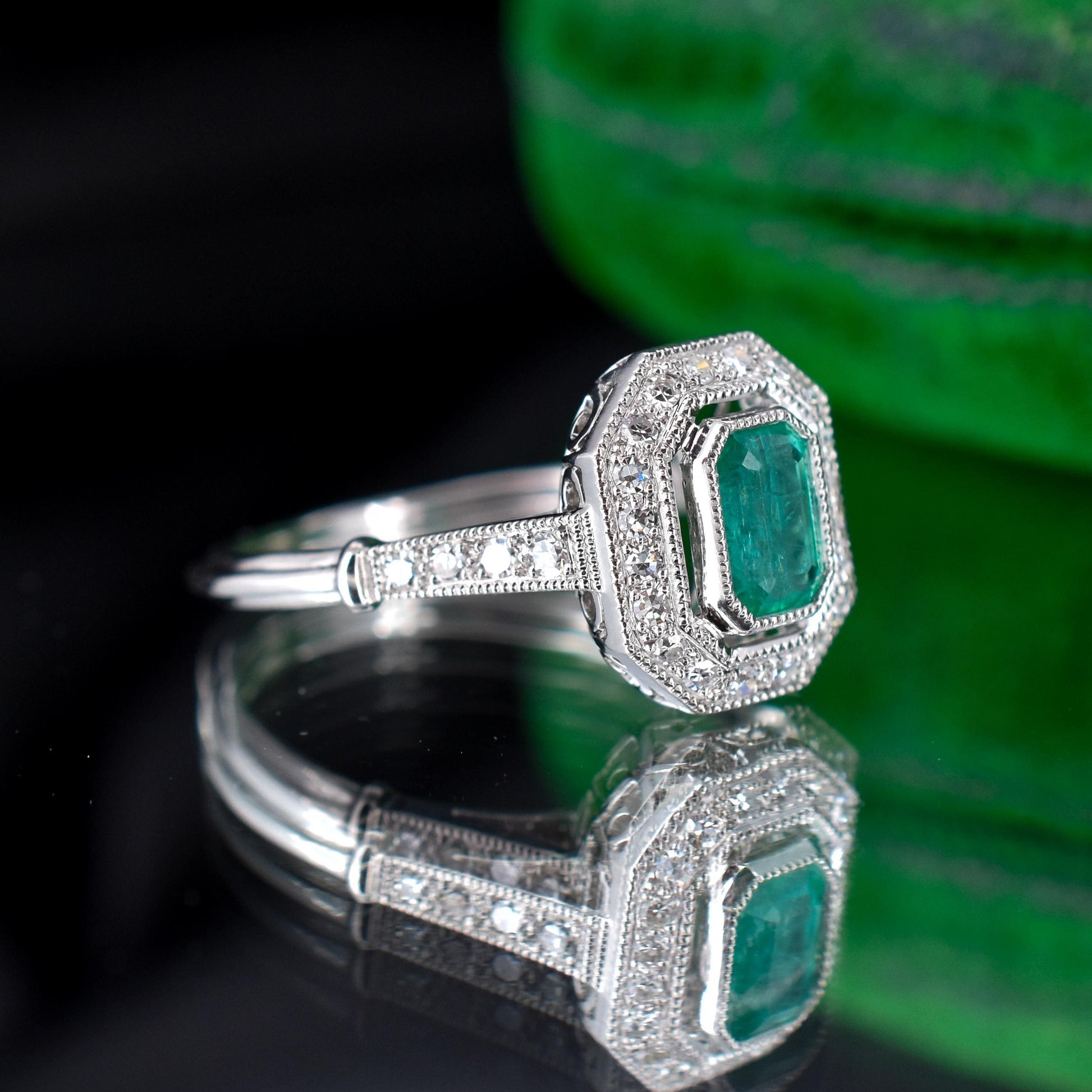 Art Deco Style Natural Emerald and Diamond Halo Platinum Ring