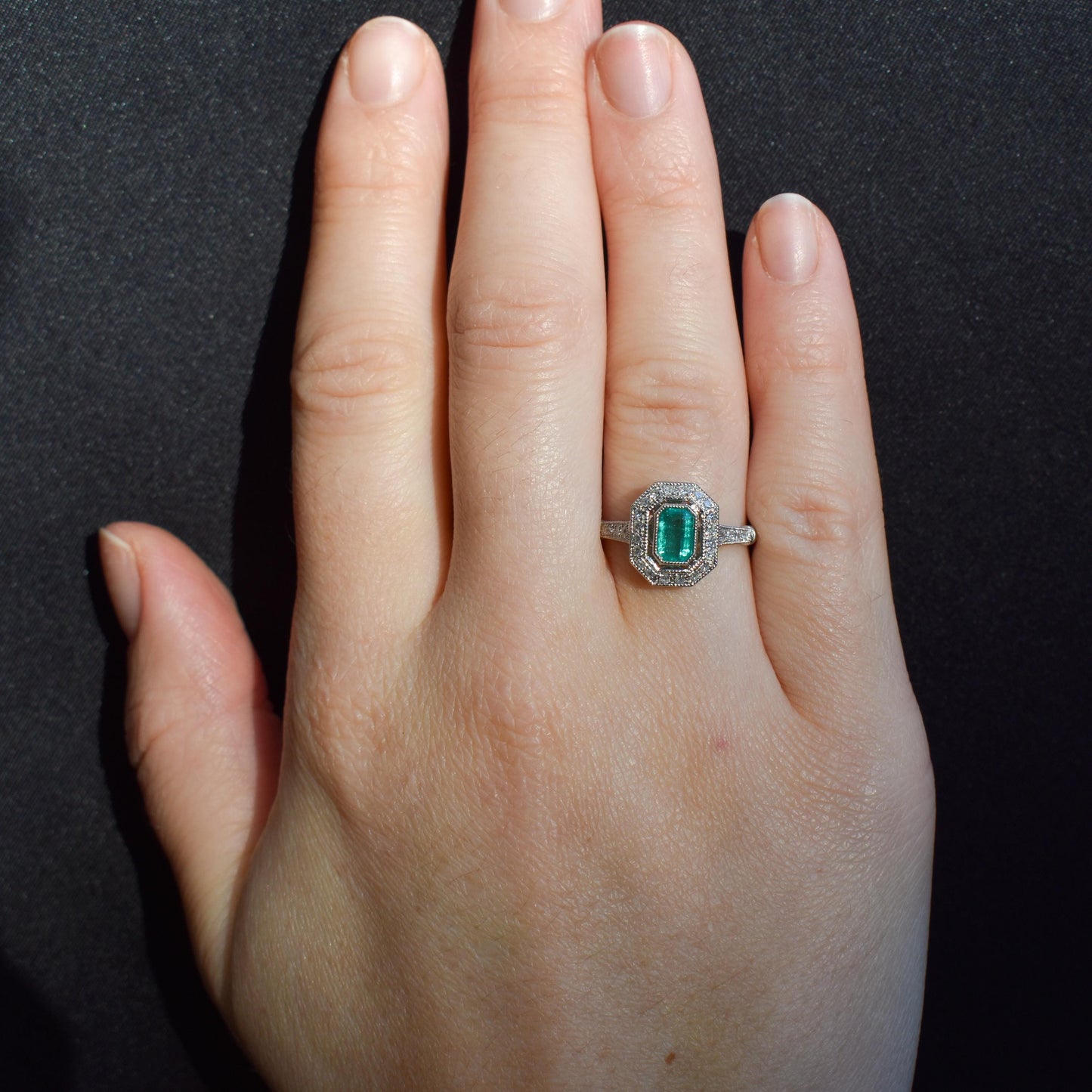 Art Deco Style Natural Emerald and Diamond Halo Platinum Ring