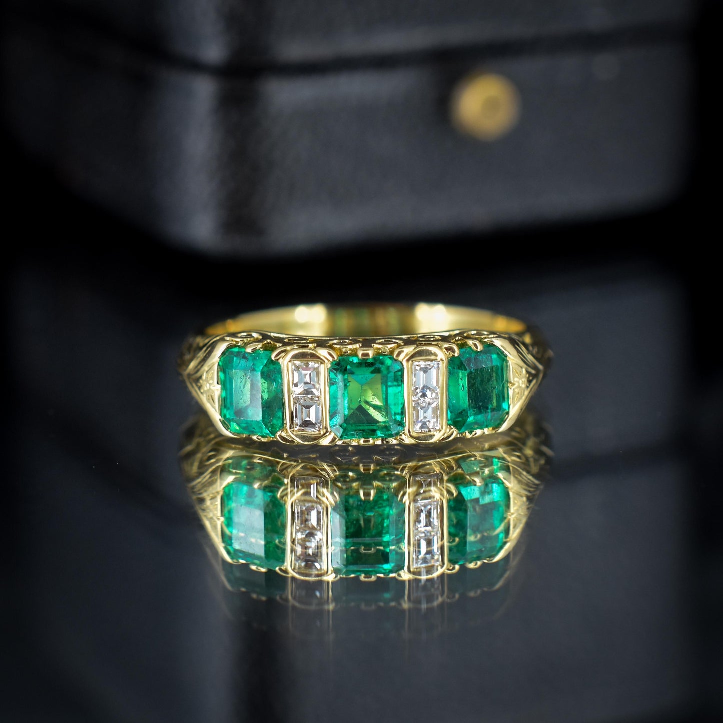 Emerald and Diamond 18ct Yellow Gold Three Stone Scroll Ring