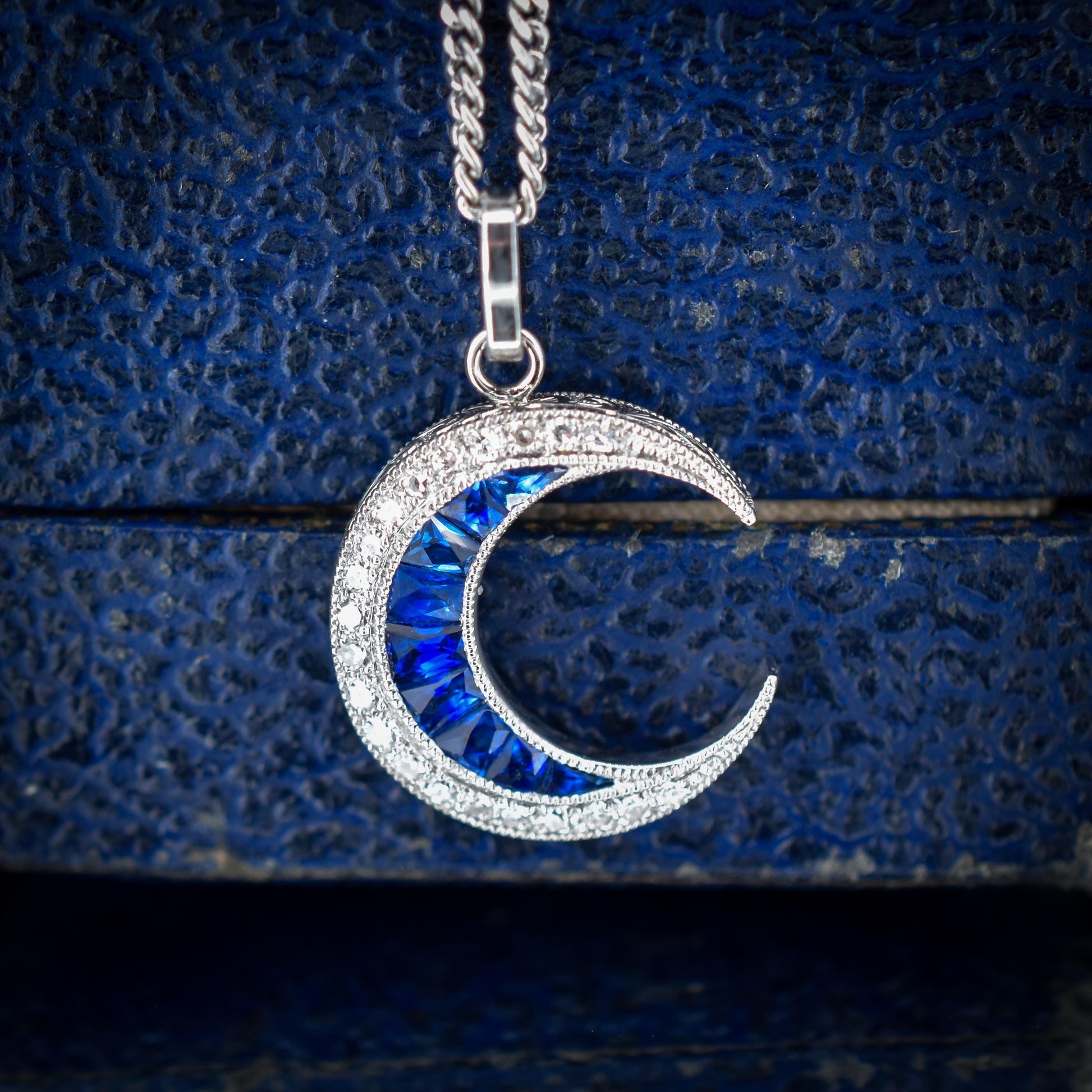 Antique Style Diamond and Blue Sapphire Crescent Moon Platinum Pendant