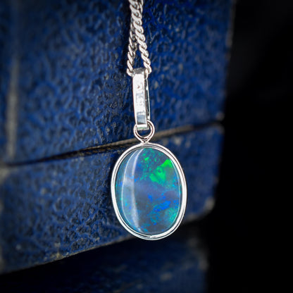 1.01ct Natural Solid Black Opal Oval Platinum Charm Pendant