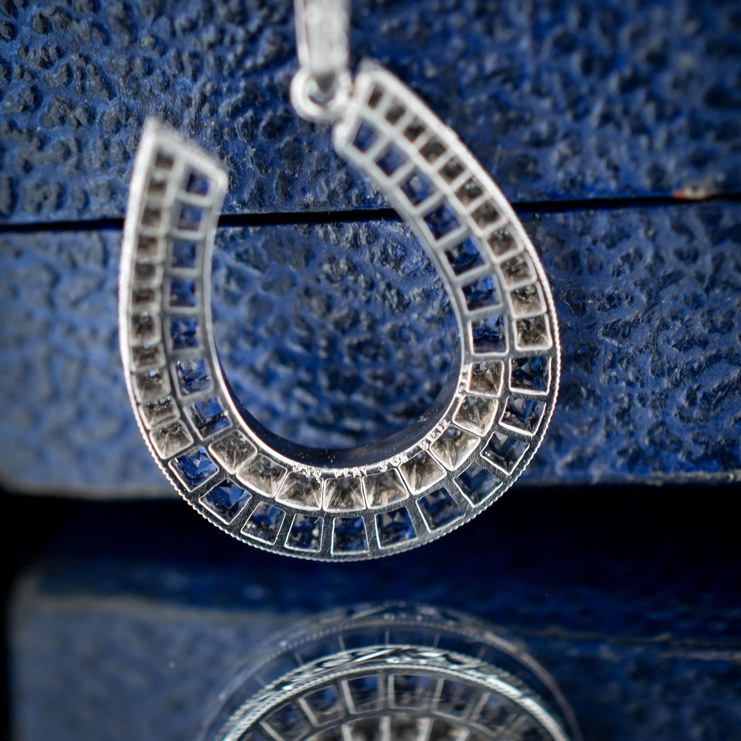 Blue Sapphire and Diamond Double Row Horseshoe Platinum Charm Pendant