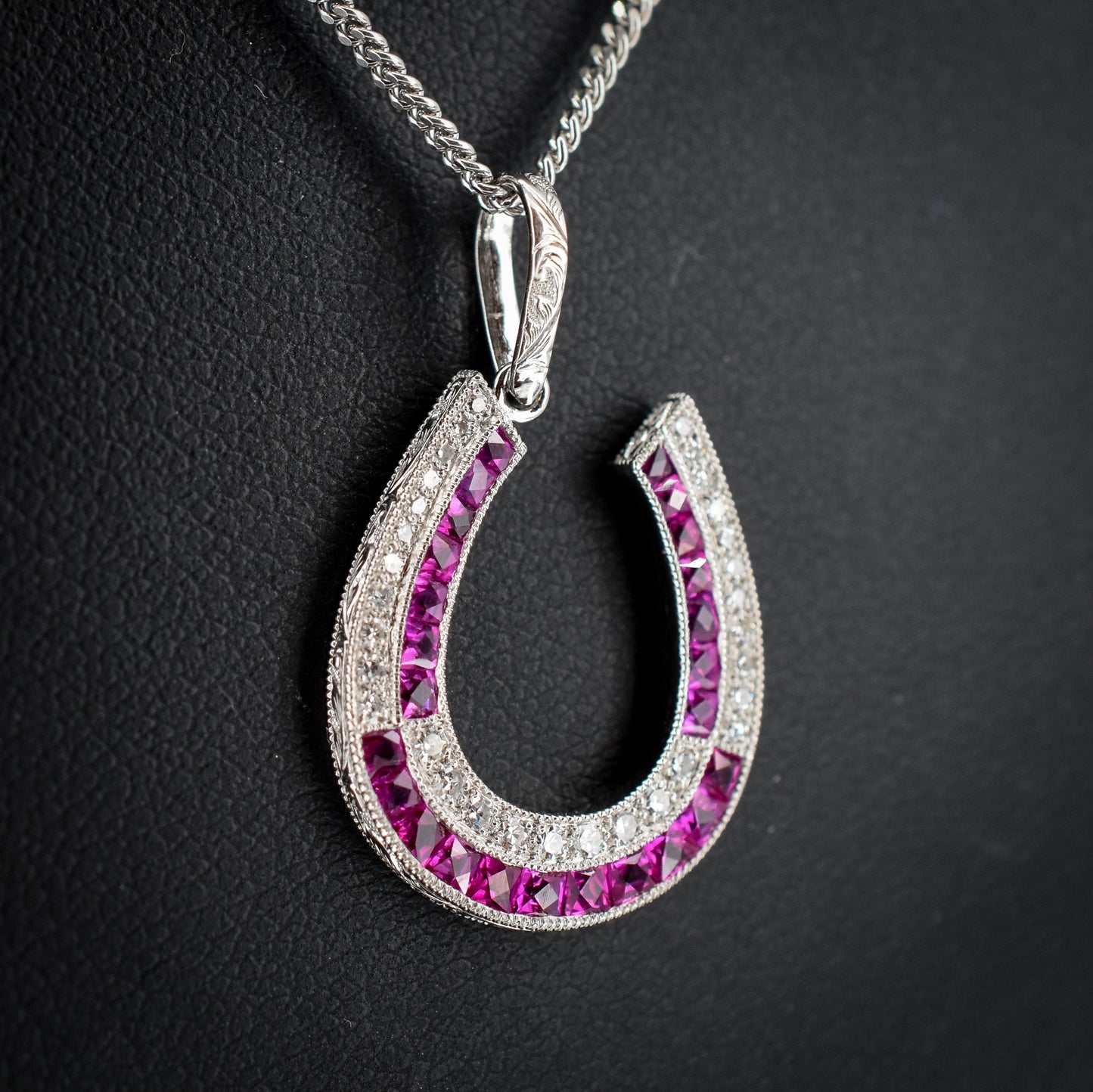 Ruby and Diamond Double Row Horseshoe Platinum Charm Pendant