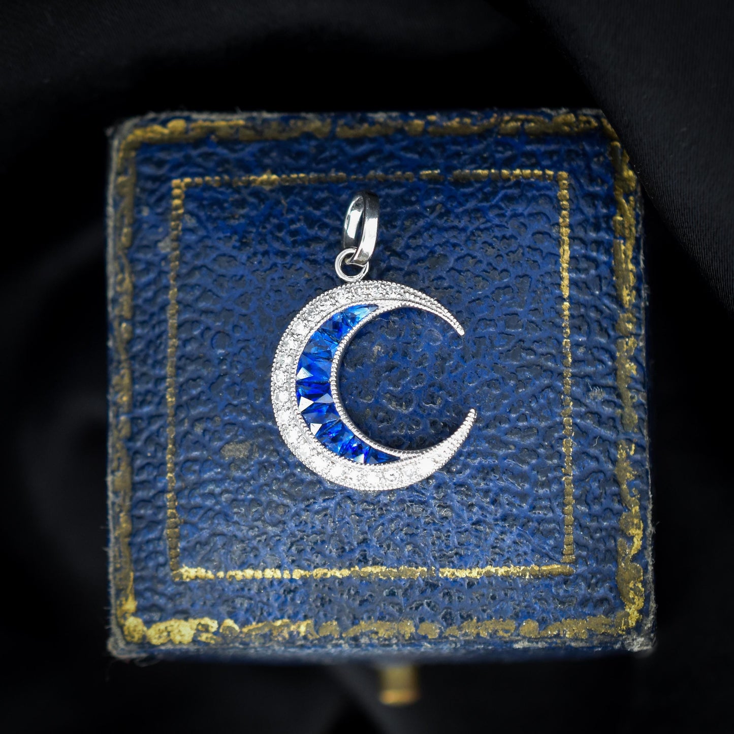 Antique Style Diamond and Blue Sapphire Crescent Moon Platinum Pendant