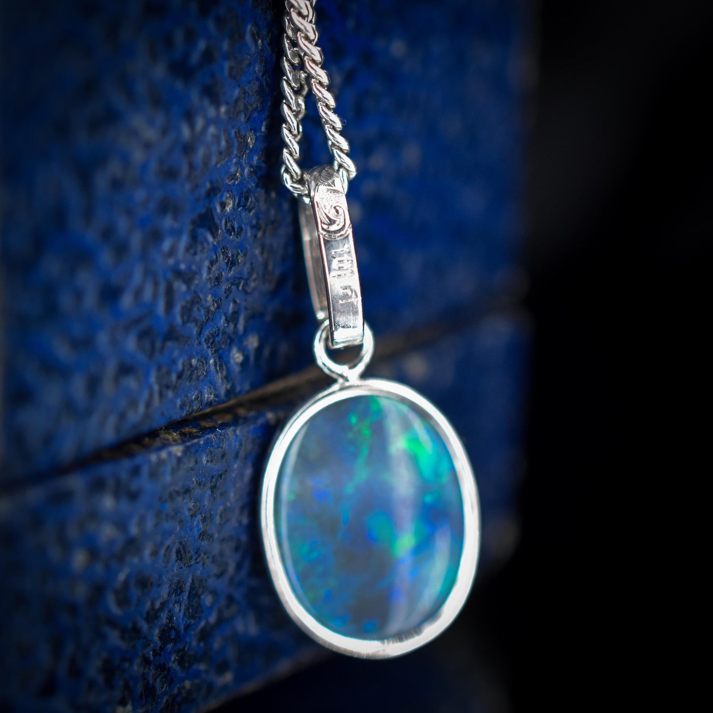 1.01ct Natural Solid Black Opal Oval Platinum Charm Pendant