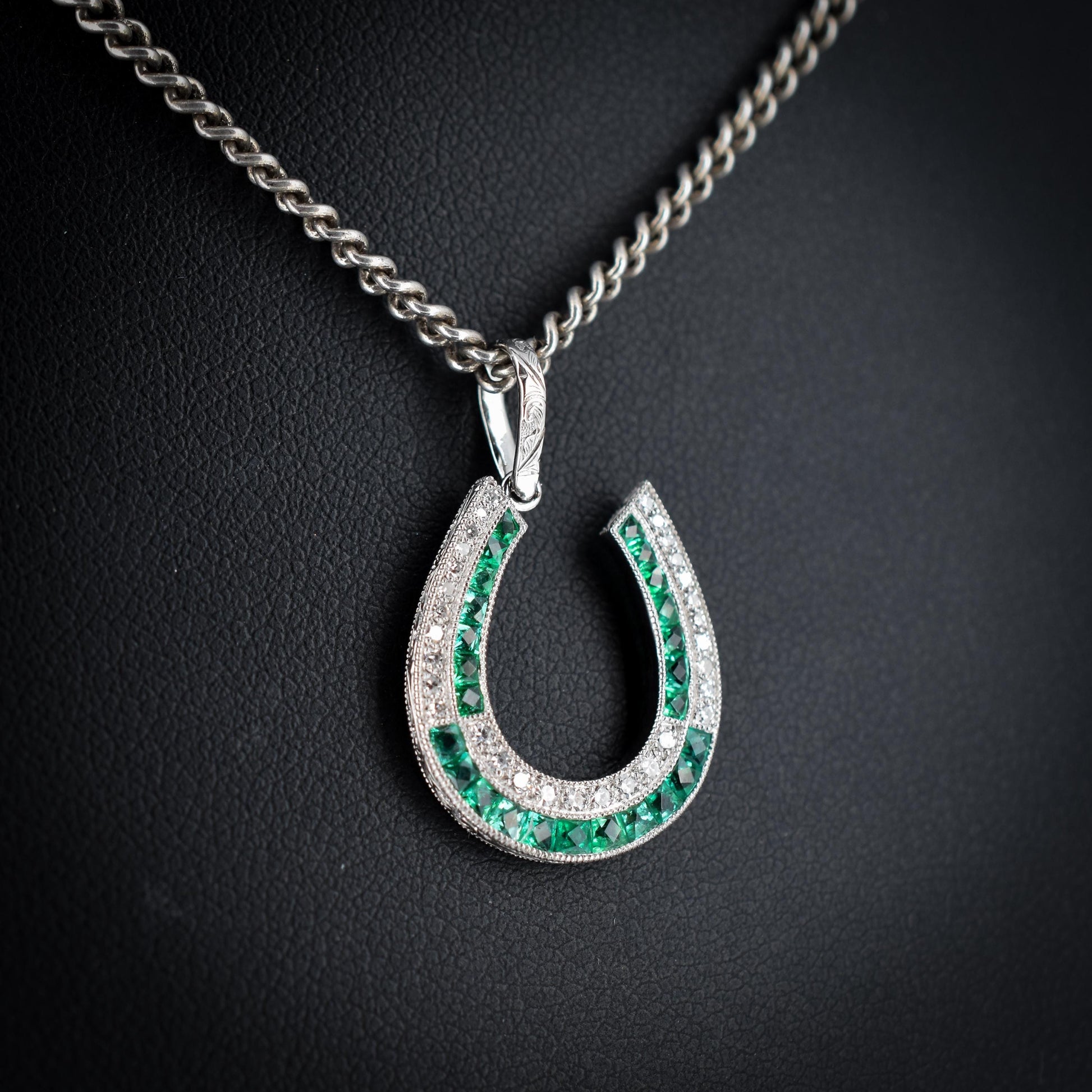 Emerald and Diamond Double Row Horseshoe Platinum Charm Pendant