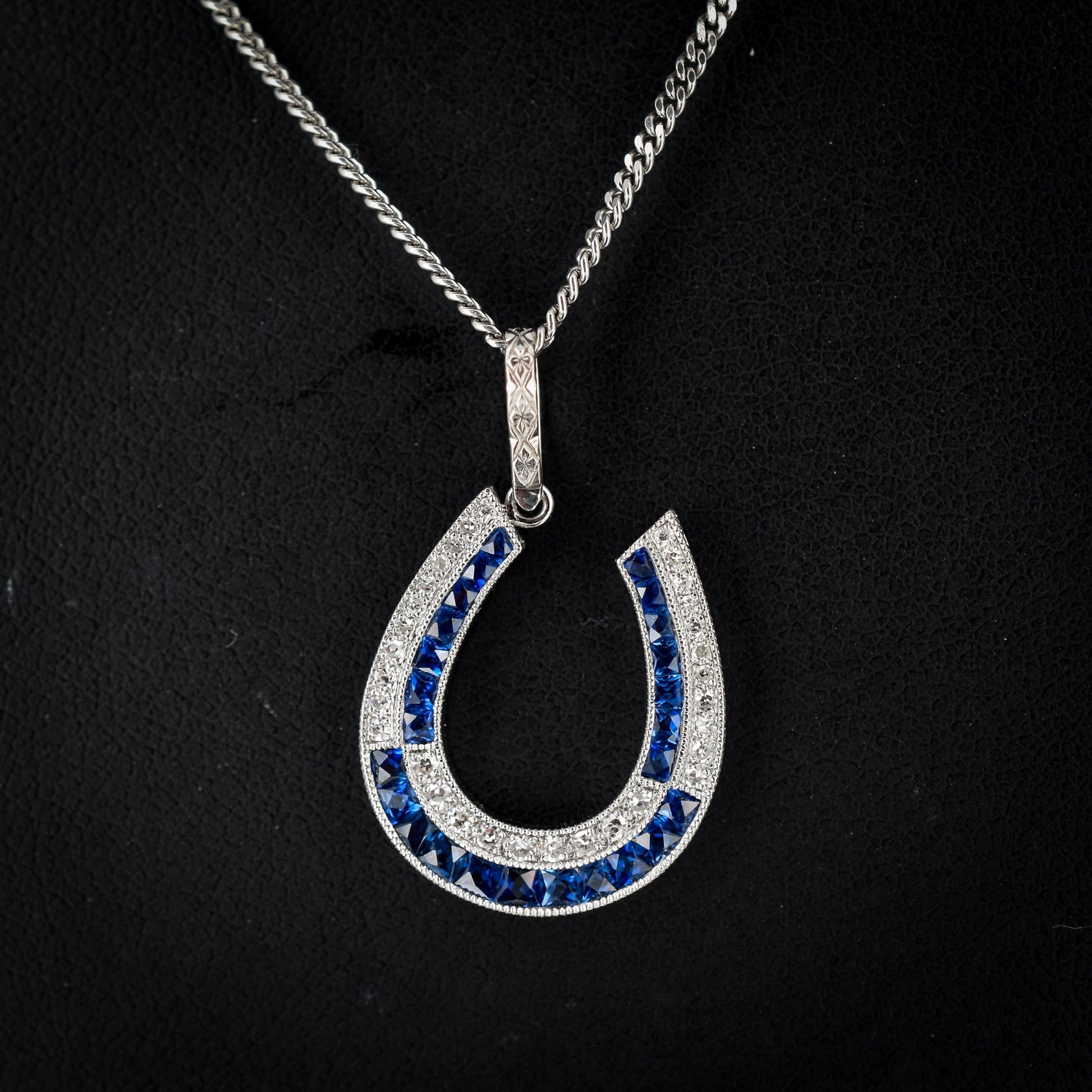 Blue Sapphire and Diamond Double Row Horseshoe Platinum Charm Pendant