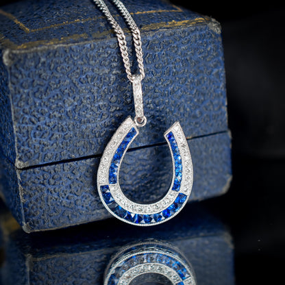 Blue Sapphire and Diamond Double Row Horseshoe Platinum Charm Pendant