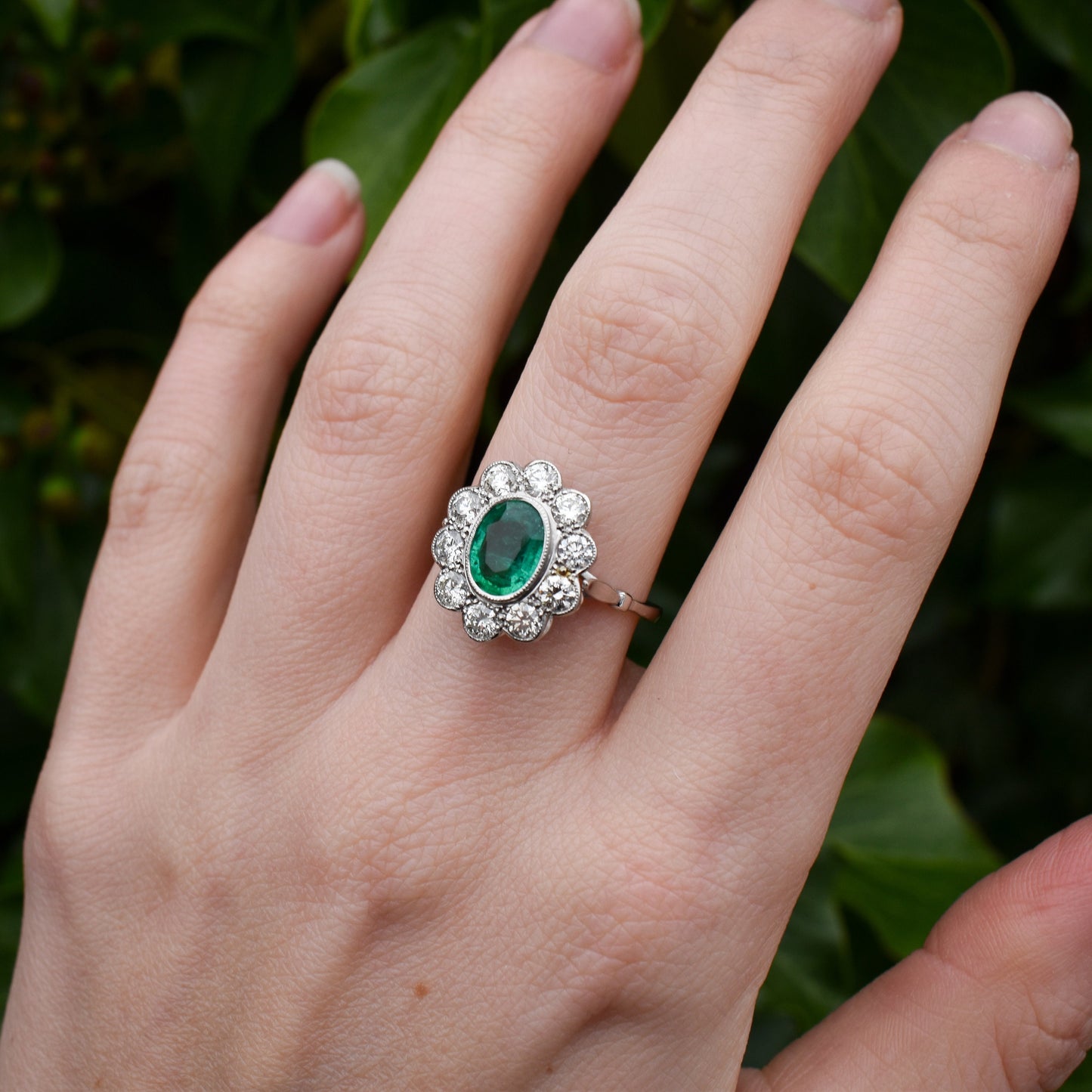 Emerald and Diamond Oval Cluster Halo Platinum Ring | Antique Style